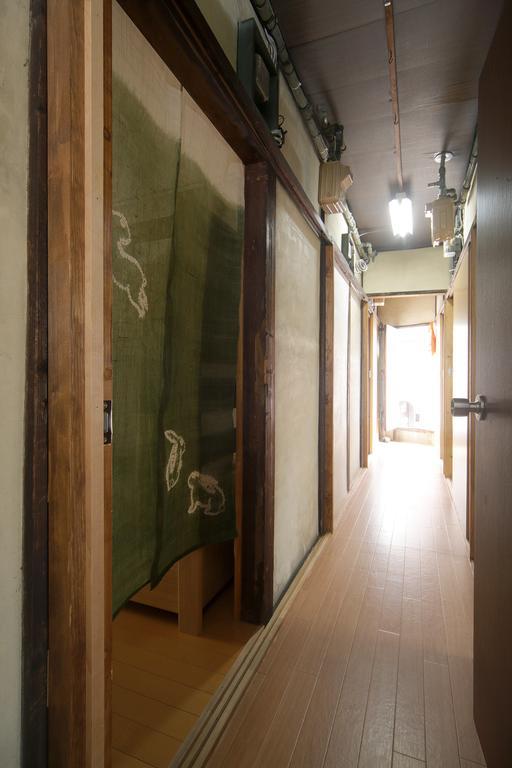 Guesthouse Oasis Осака Екстер'єр фото