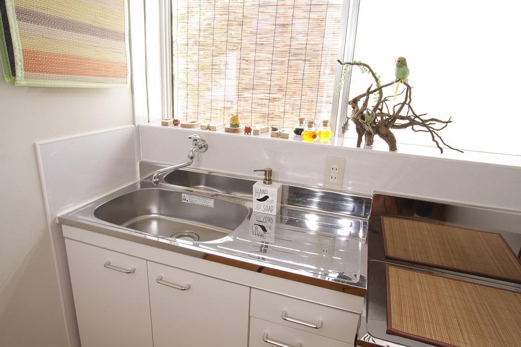Guesthouse Oasis Осака Екстер'єр фото