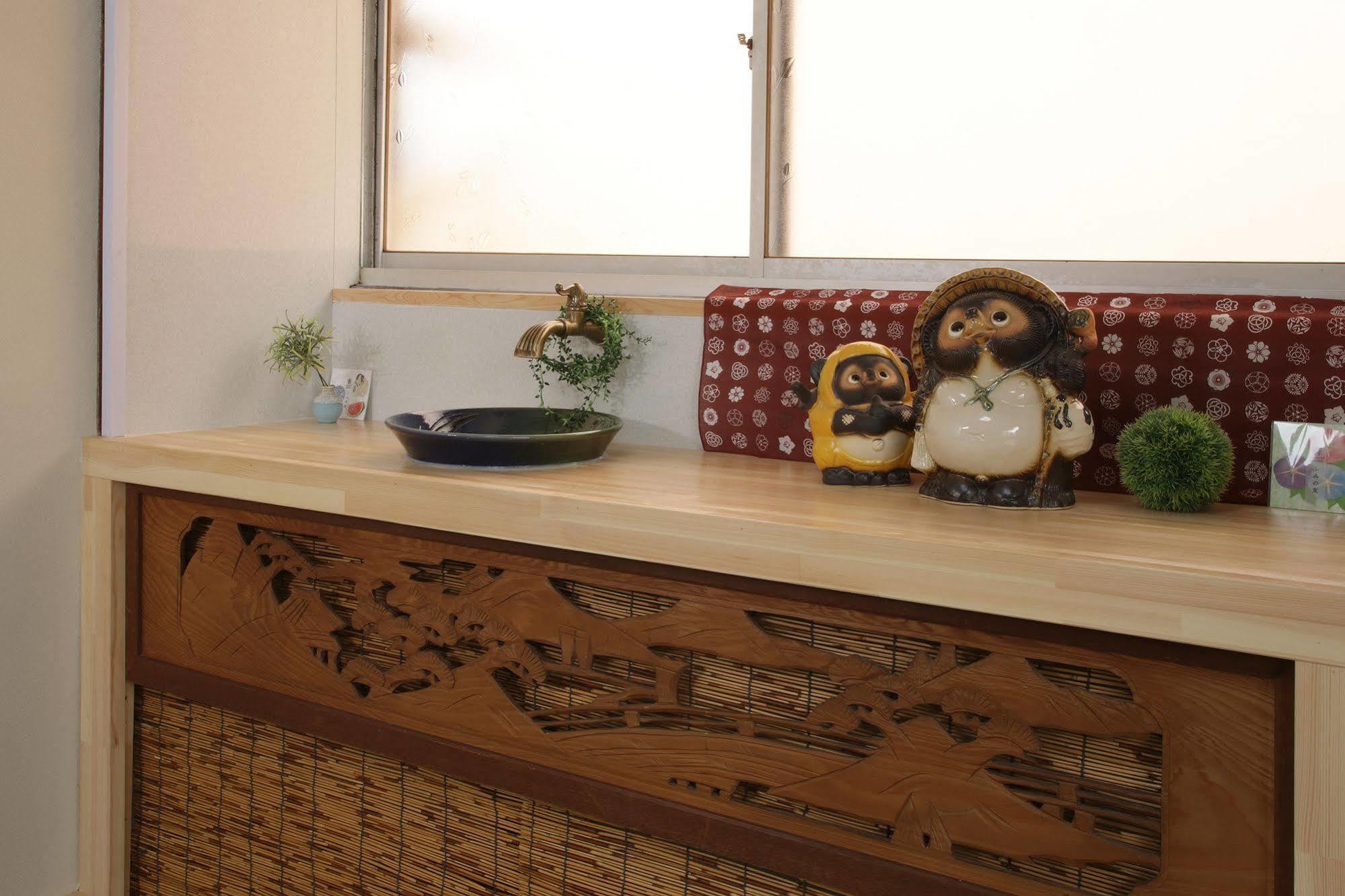 Guesthouse Oasis Осака Екстер'єр фото